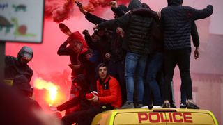 Liverpool Fans Get Rowdy, Hop On Police Vans